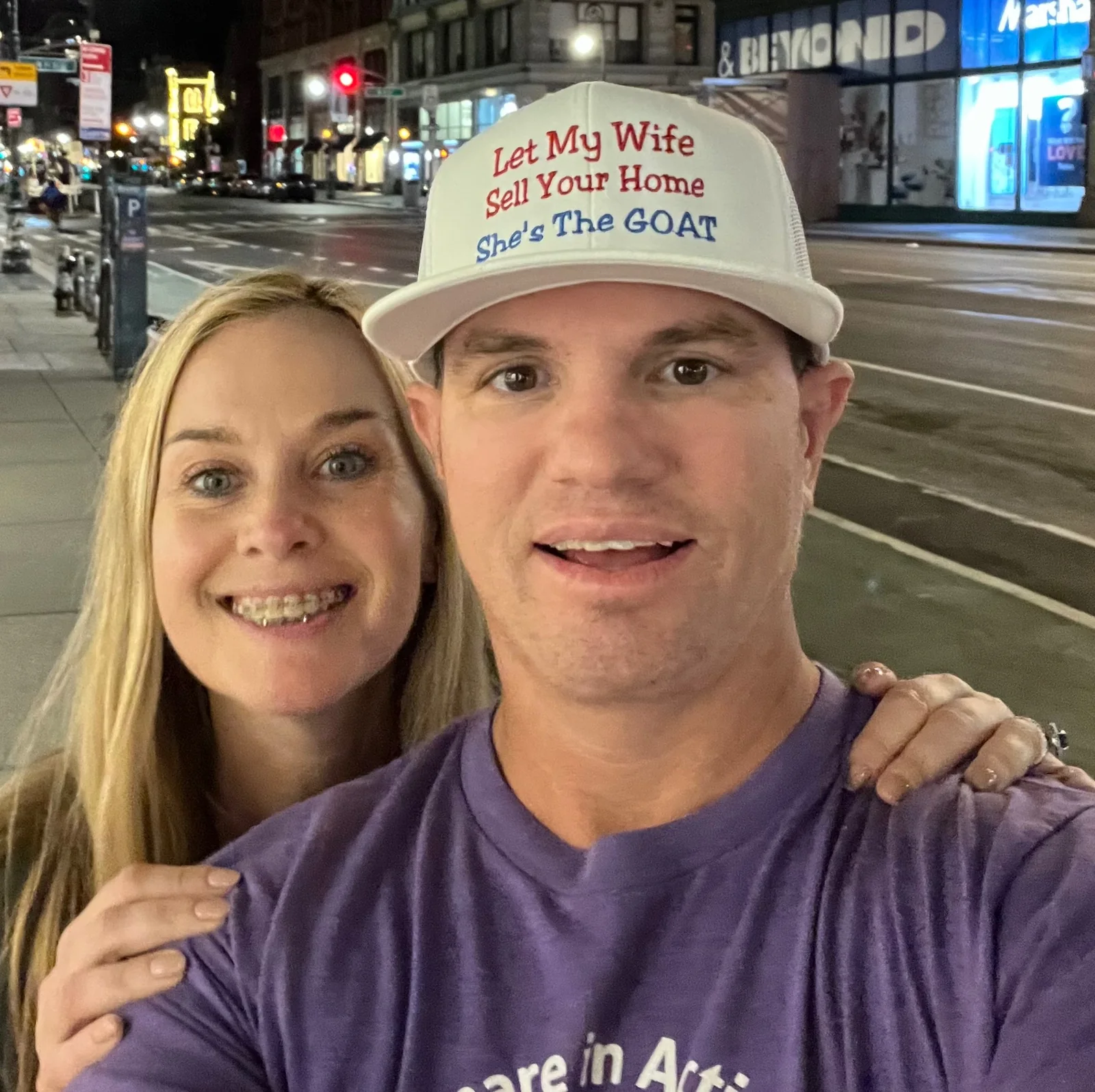 Traynor and Jessica together on a city street